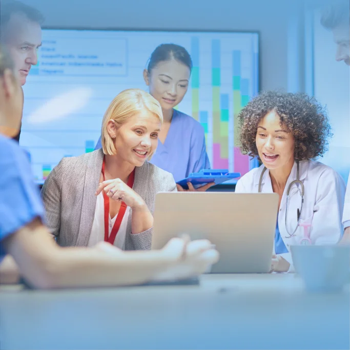 Non-behavioral medical office team relying on IT support for HIPAA compliance and reliable systems.